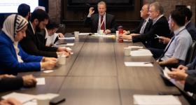 Professor Jon Deason leading the meeting