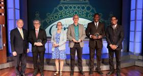Faculty honors winners pictured with their awards
