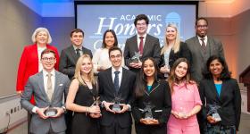 President Ellen M. Granberg and Provost Christopher Alan Bracey recognized the 10 Distinguished Scholars in a ceremony Thursday at University Student Center.